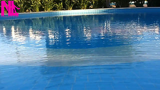 Barefoot Dangling in Swimming Pool Water