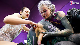 Heavy Tattooed Sub Played with and Pegged by 2 Dominas