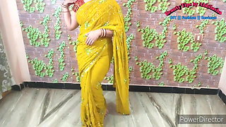 Mother wears a yellow saree