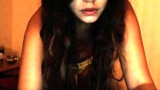 Small titted brunette teen fingering on the bed