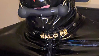MILF in Bitbit Gag in Chained Latex Dress